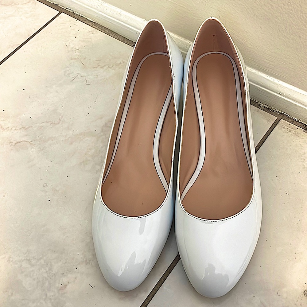 Brand new, never worn, white patent leather shoe. Size 12.5. Brand MODENCOCO.